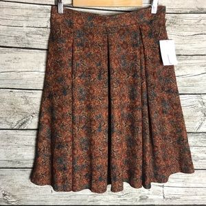 LuLaRoe Madison Skirt Size: L Brown Floral, Black Background